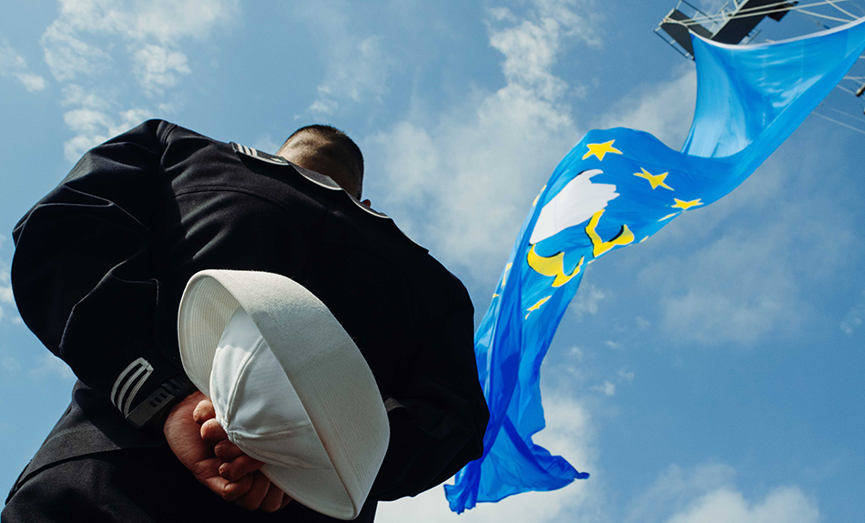 Navy Petty Officer 1st Class Marc Cuenca mans the rails on the aircraft carrier USS George Washington during operations in the Atlantic Ocean, April 25, 2024. The George Washington is deployed as part of Southern Seas 2024, which seeks to enhance capability, improve interoperability and strengthen maritime partnerships with countries throughout the U.S. Southern Command area of responsibility.